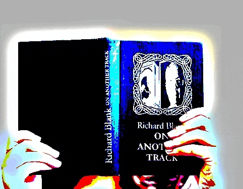 a person holding a book titled on another track