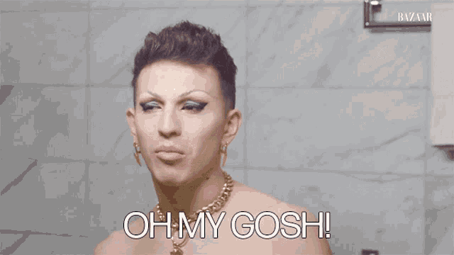 a man says oh my gosh in front of a wall