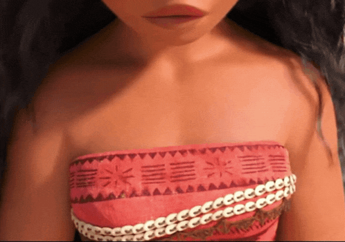 a close up of a woman 's chest and shoulder