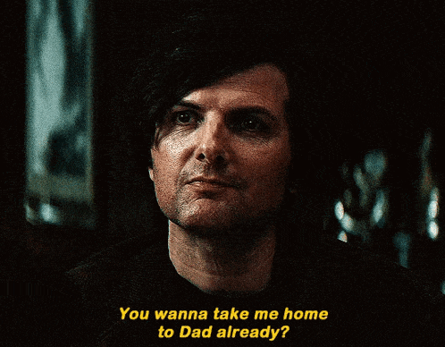 a close up of a man 's face with the words you wanna take me home to dad already