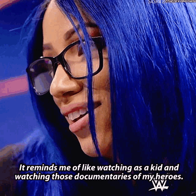 a woman with blue hair and glasses says it reminds her of watching as a kid