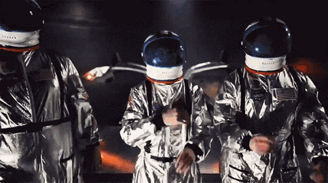 Astronauts Taking Helmets Off GIF - Astronauts Taking Helmets Off Revealing Identity GIFs