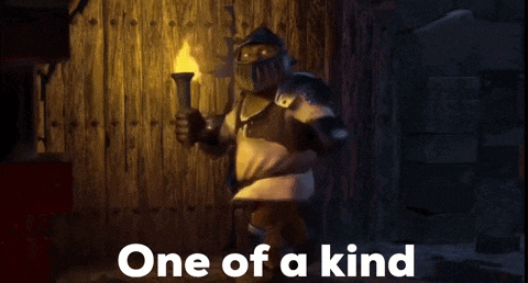 a cartoon character is holding a torch and the words one of a kind are above him