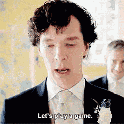 a man in a suit says let 's play a game .