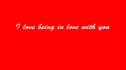 a red heart with white hearts and the words " i love being in love with you happy valentine 's day "