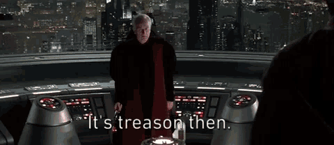 a man holding a light saber with the words it 's treason then