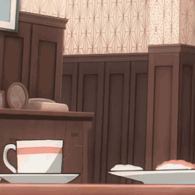 a cup of coffee sits on a saucer on a wooden table