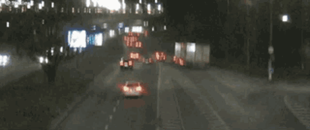 a blurred image of a highway at night with a truck that says ' a ' on it