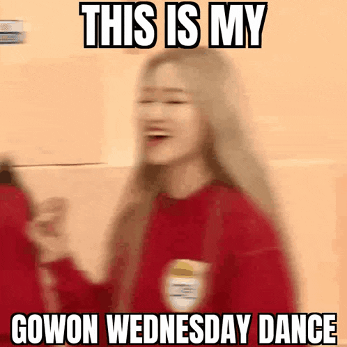 a blurry picture of a woman in a red sweater with the caption `` this is my gowon wednesday dance '' .