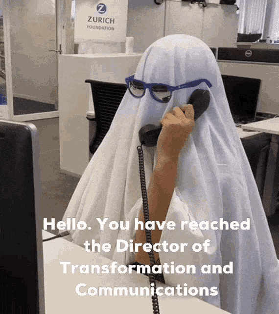 a ghost is talking on a phone in front of a zurich sign