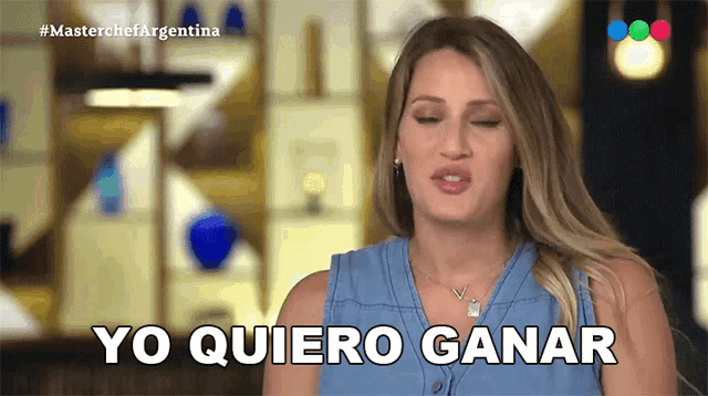 a woman with her eyes closed says yo quiero ganar in spanish