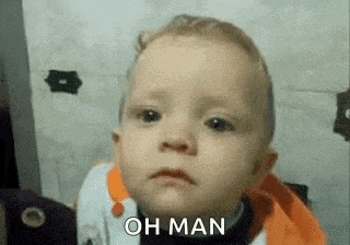 a baby is making a sad face and saying oh man .