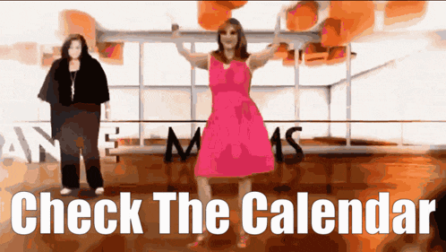 a woman in a pink dress is standing next to another woman with the words check the calendar behind her