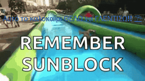 a water slide that says remember sunblock on the bottom