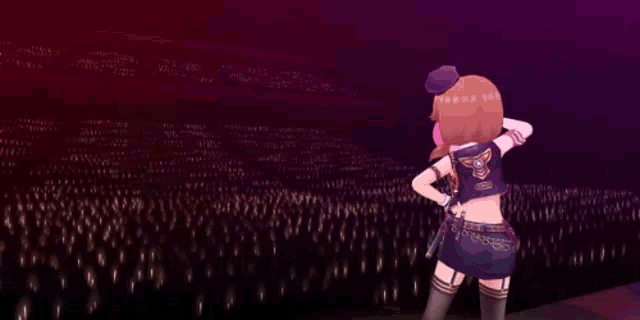 a girl holding a fan in front of a crowd