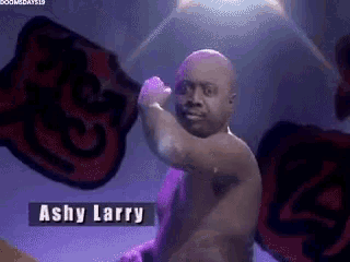 a shirtless man with the name ashy larry written on the bottom