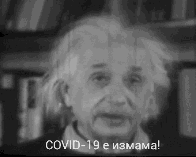 a black and white photo of albert einstein with the caption covid-19