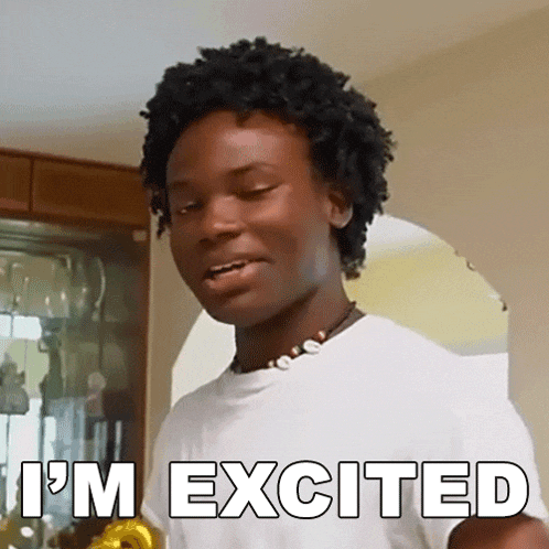 a man in a white shirt with the words i 'm excited written on it