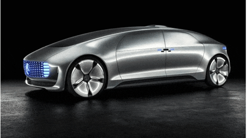 a silver car with a mercedes logo on the front