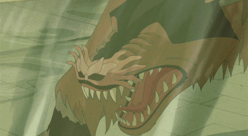 a cartoon drawing of a monster with its mouth open and sharp teeth