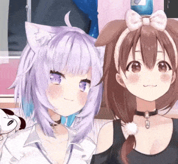 two anime girls are posing for a picture together