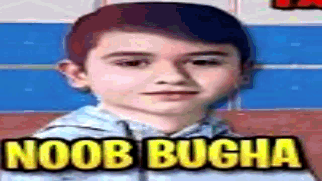 a young boy is standing in front of a sign that says noob bugha .