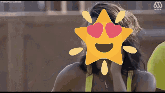 a woman with a star in front of her face with hearts in her eyes