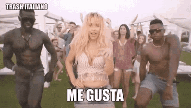 a group of people are dancing in a video with the caption me gusta