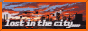 a picture of a city skyline with the words lost in the city