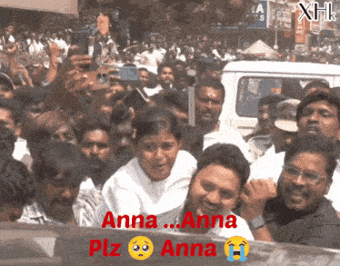 a crowd of people with the words anna anna plz anna written in red