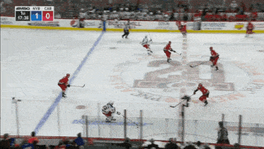a hockey game is being played at the pnc arena and the score is 1-0