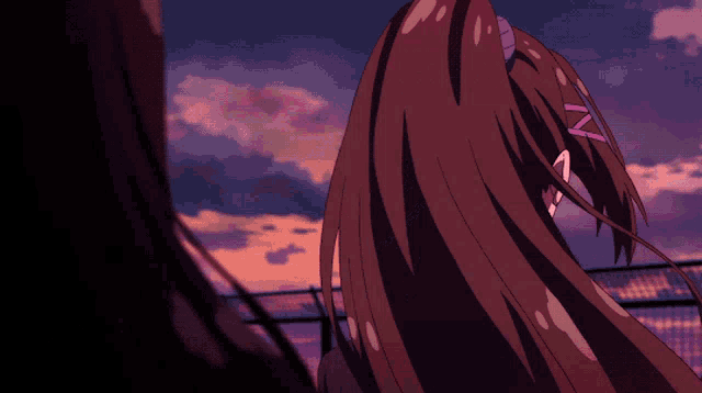 a close up of a anime girl 's face with red eyes