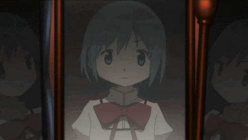 a girl with blue hair and a red bow tie is smiling