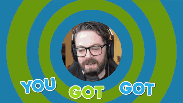 a man wearing headphones and glasses is surrounded by a circle that says you got got