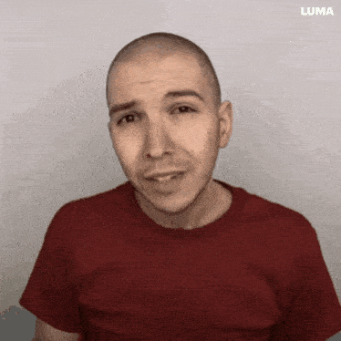 a close up of a man 's face with the word luma on the bottom right
