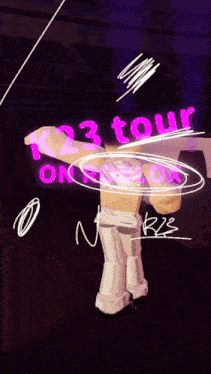 a sign that says k23 tour on it in pink