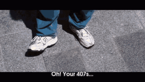 a person wearing a pair of new balance shoes says " oh your 407s ... "