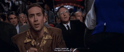 a man in a suit says listen i gotta go the fight is starting