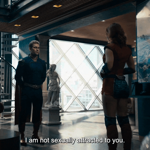 a man and a woman are standing in a room and the woman says i am not sexually attracted to you