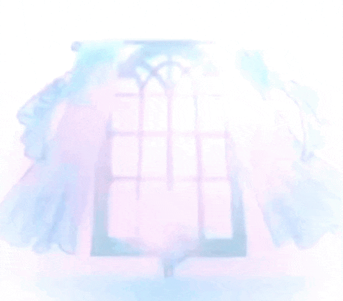 a window with blue curtains and the sun shining through it