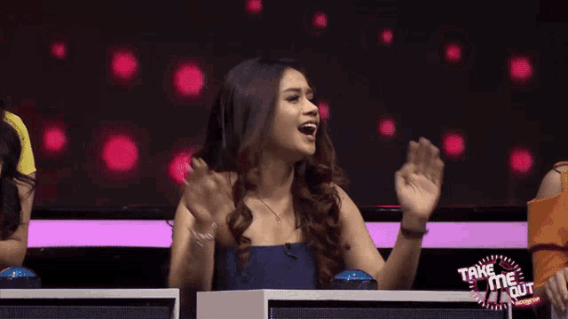 a woman sitting at a table with the words take me out on the bottom