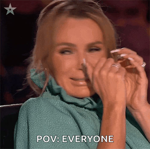 a woman in a green sweater is covering her face with her hands and says pov : everyone