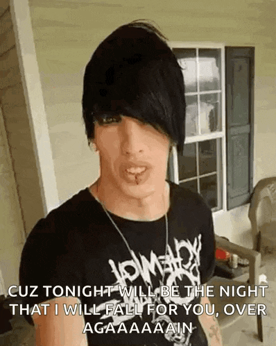 a man with a piercing in his lip is wearing a black shirt that says cuz tonight will be the night that i will fall