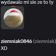 a picture of a cookie with a santa hat on it and the words wydawalo mi sie ze to ty below it