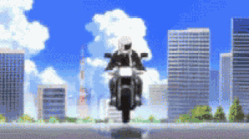 a man is riding a motorcycle in front of a city skyline
