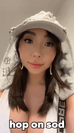 a woman wearing a white hat and a white top says hop on sod .