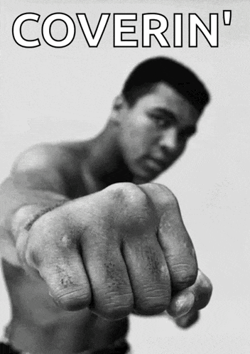 a man without a shirt is pointing his fist at the camera with the words coverin ' on the bottom