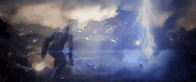 captain america is running in a dark room with a lightning bolt coming out of the sky .