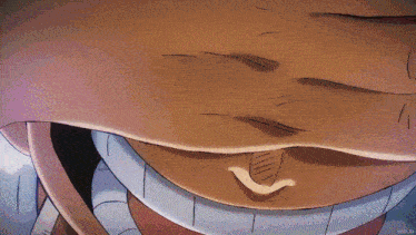 a close up of a person covering their eyes with their fingers