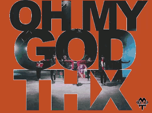 a poster that says oh my god thx with a group of people in the background